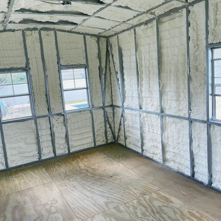Closed-cell spray foam insulation applied to wall cavities in a residential project in Trumann